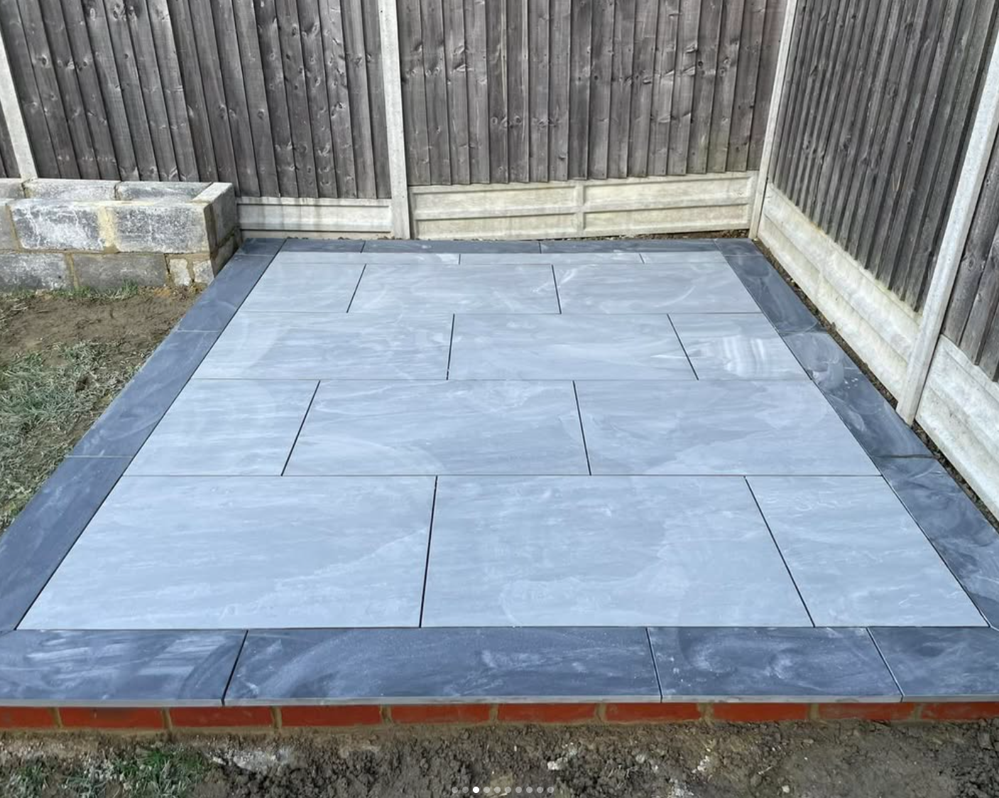 Pale paving with a contrasting dark border